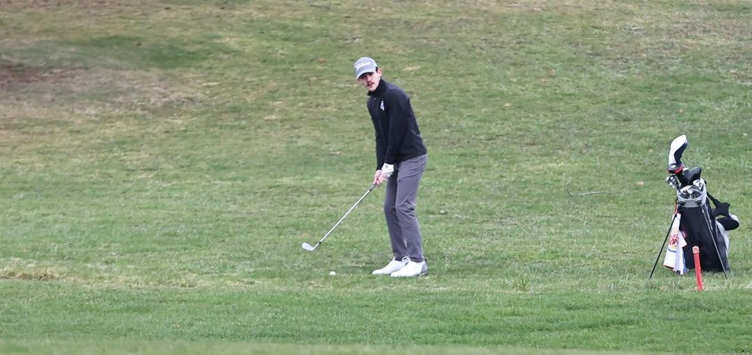 Patrick Tammariello addresses an approach shot.