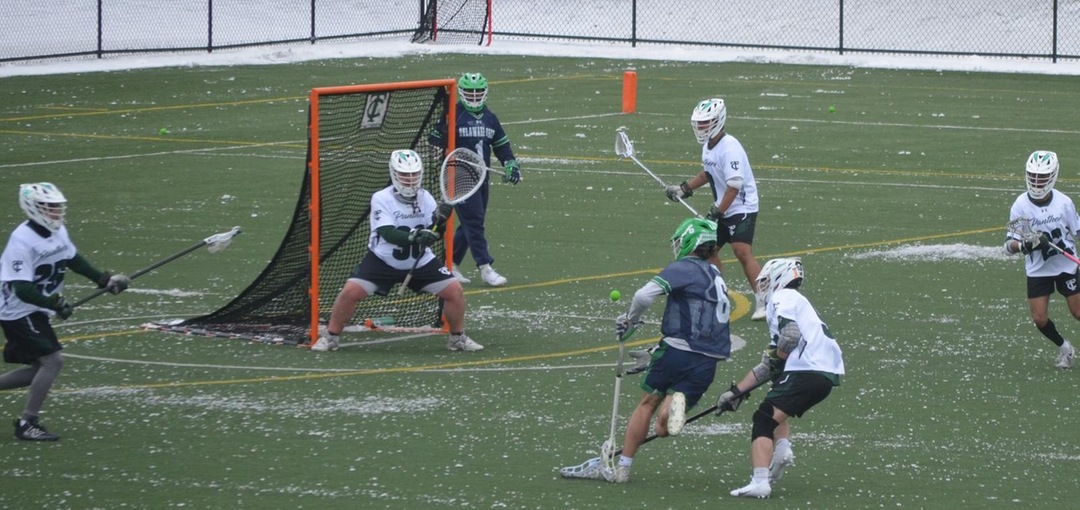 Goalie Cameron Cherry and the defense in action against Delaware Tech.